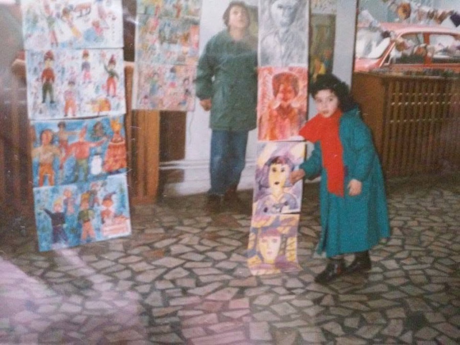 Andreea-Cristina Mircea as a child at her first exhibition, 1995